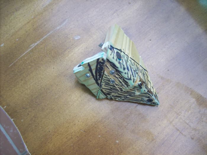 One view of the bow mold. I used wood for this also. The dark lines are to mark where the edges of the bow should be. Something like this can be used for multiple bows.