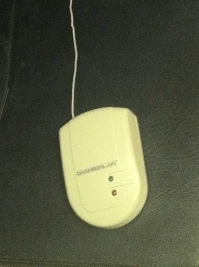 The indoor receiver is about the size of a single light switch plus an unobtrusive antenna that receives the signal from the garage door.