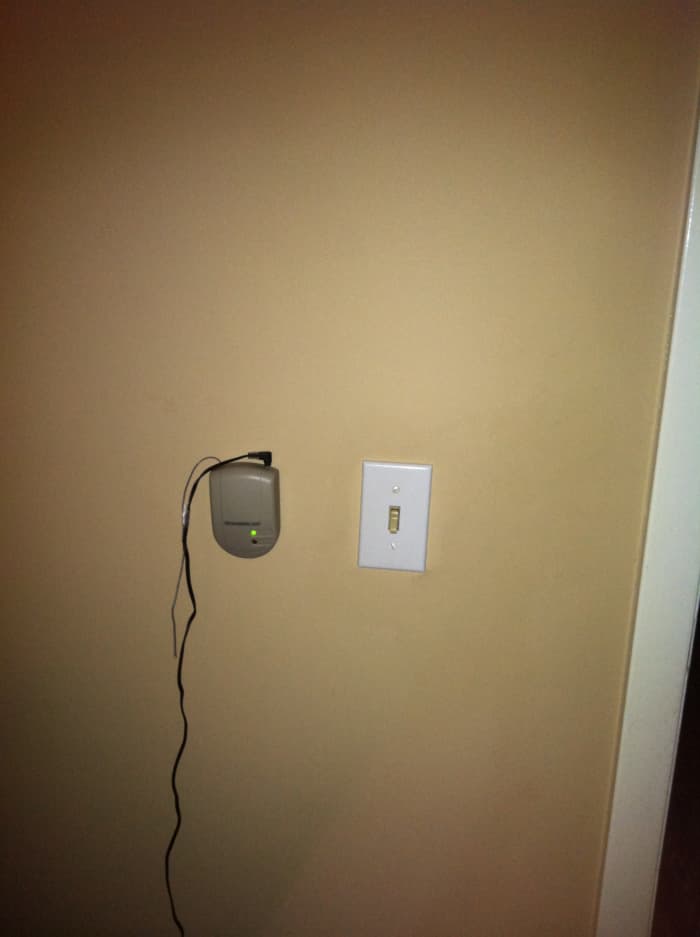 The indoor receiver, completely assembled and installed conveniently next to the master bedroom light switch.
