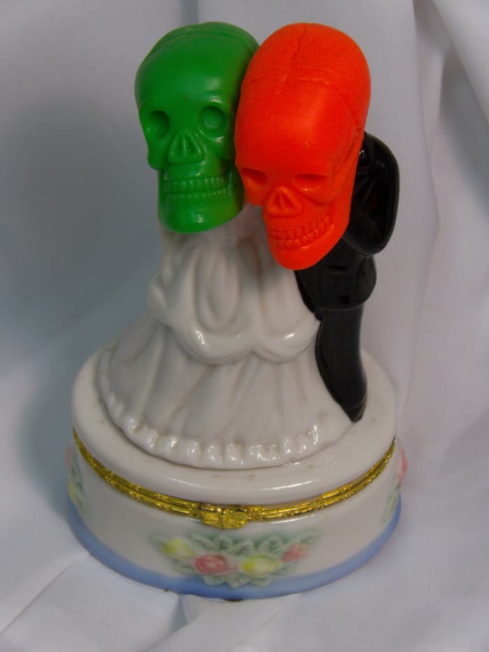 He has a sense of humor and mine like this decoration just the way it is. He is said to be fond of bones, you see.