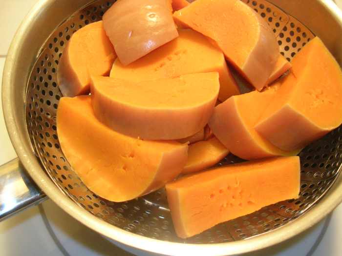 Crescents of butternut squash done to perfection, shown by the deep fork holes. The fork slid right through the crescents with no resistance.