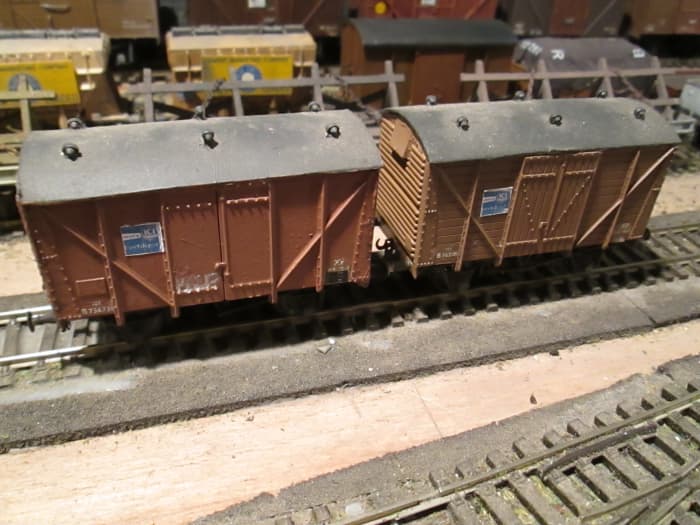 A pair of early British Railways' vans, on the left a plywood-sided version of the planked one on the right (both Parkside kits with bought-in detailing)