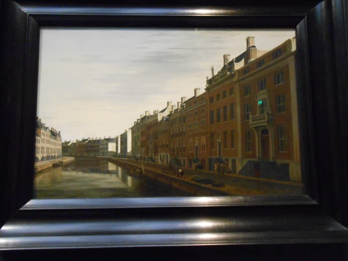 Painting of Old Amsterdam that is so clear in person it almost looks like a photograph.