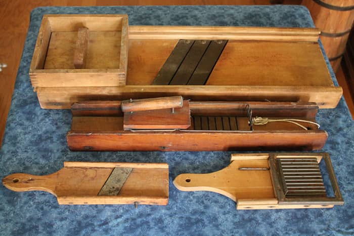 Wooden cabbage and vegetable slicers were made in all sizes and used different styles of cutting blades