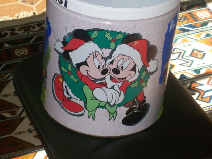 And sometimes you don't have to do anything. Christmas popcorn cans are great, especially to hold toys. The popcorn isn't bad either!