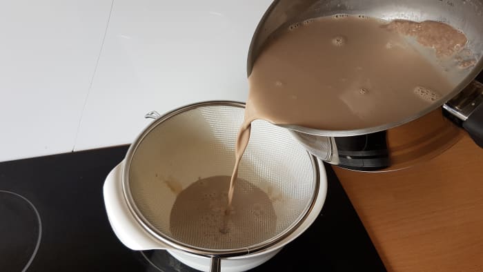 It's really important to strain the mixture as you will almost surely get some solid particulates as you can see in the pot.