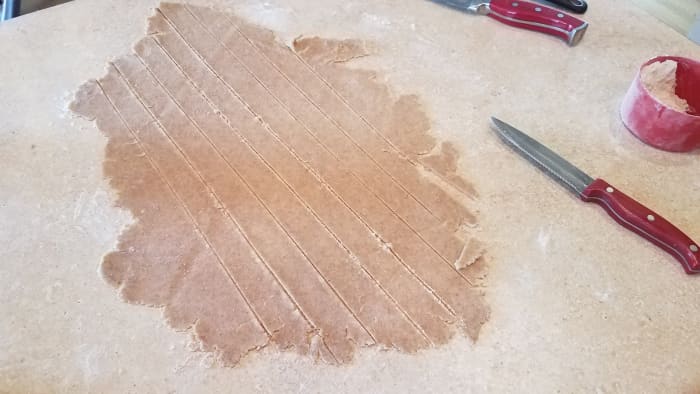 Roll out your second crust and cut into 1 inch long slices. (If you'd rather have a solid top crust, don't slice them, just transfer the second crust over.)