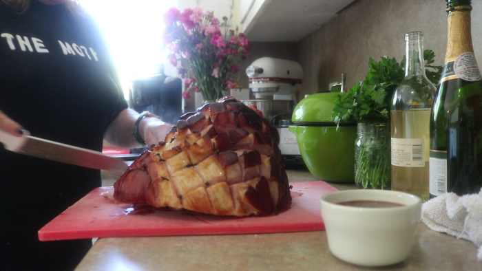 Allow the ham to rest at least 10-15 minutes before carving. Carve by slicing on the long sides, working carefully to create thin slices.