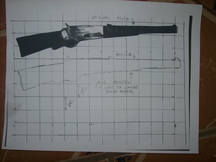 The top image is a cutout about 10" long of a Winchester. The bottom sketch of the top photo is what you will use to transfer to a larger grid.