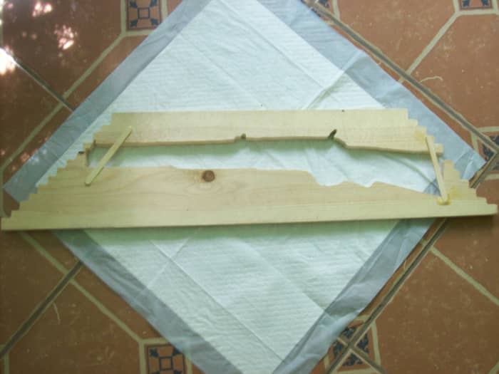 Backboard repair if you accidently break through the left or right as I did (popsicle sticks.) This is the back side of what was left over after cutting, used as mounting board.