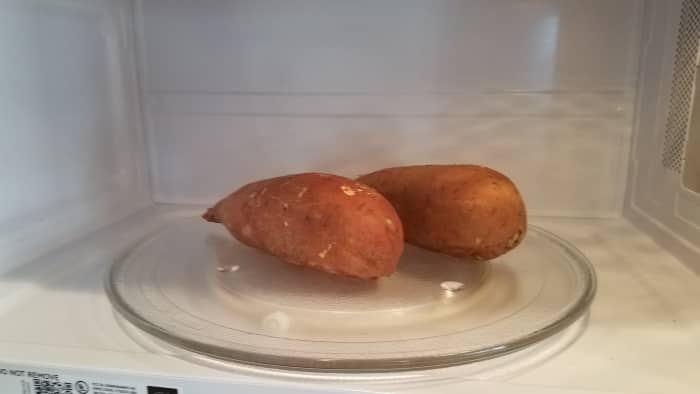 Begin by cooking your sweet potatoes. I chose to cook mine in the microwave for speed, poking fork holes in each of them first for venting.