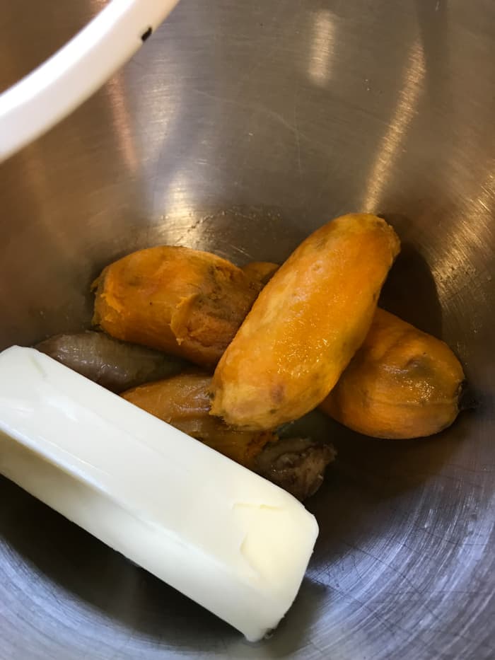 Beat together the sweet potatoes, bananas and butter until smooth. This helps make sure the rest of the ingredients incorporate fully.