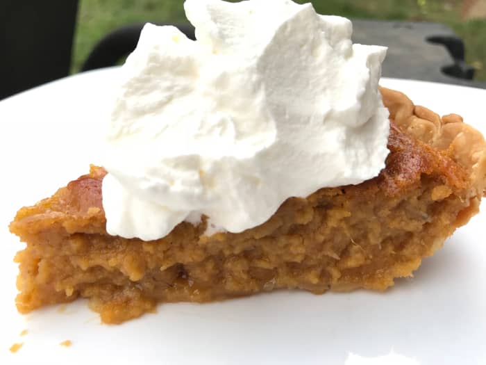 Southern sweet potato pie is a classic holiday dessert - a silky custard pie that is perfectly paired with freshly whipped cream.
