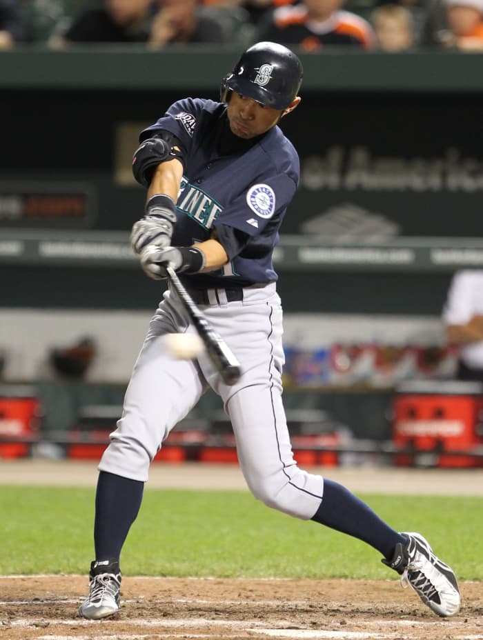 Former Seattle Mariners outfielder Ichiro Suzuki makes contact during a game in 2011.