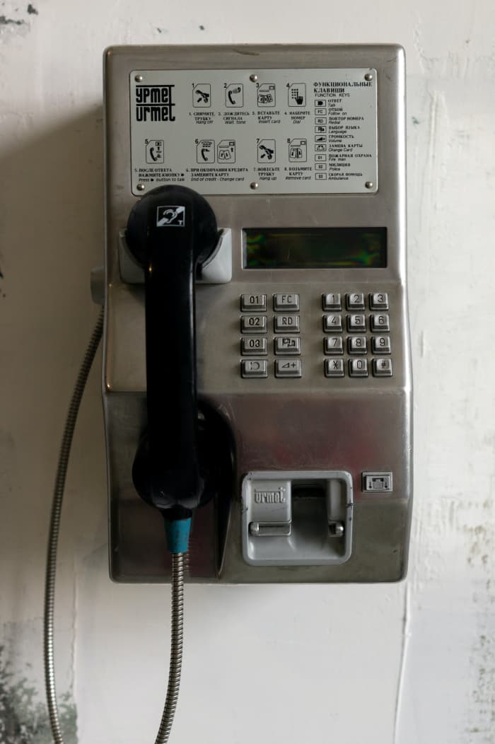 Sometimes payphones are in booths, but some are affixed to walls. Special thanks to Daria Sannikova for the use of your photo.