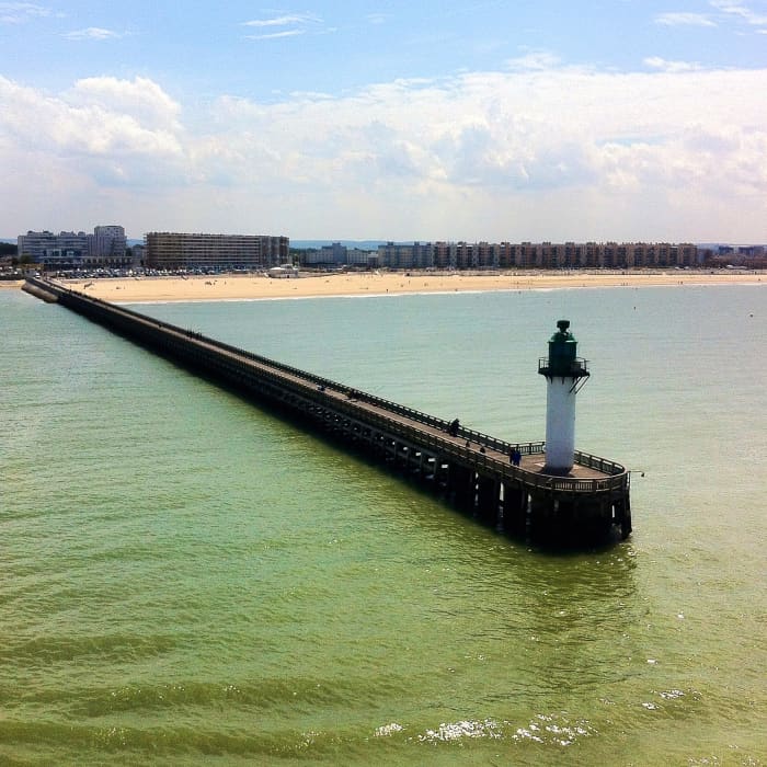 The pier and lighthouse of the port of Calais
