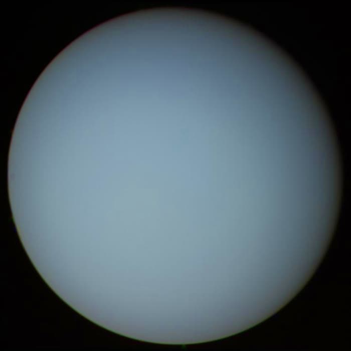 Uranus' eccentric rotation: spinning backward and on its side