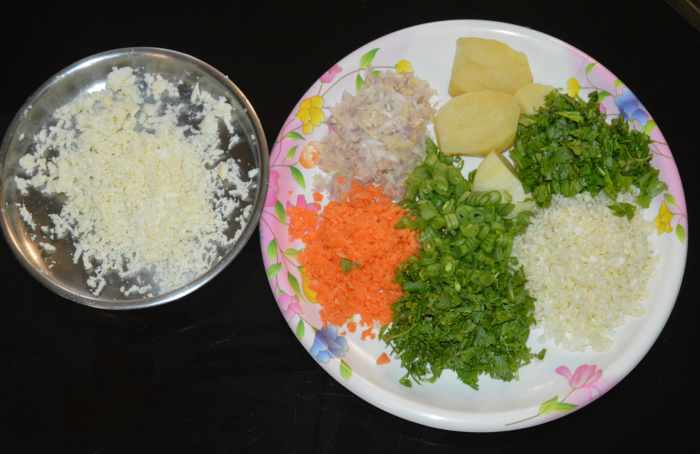 Step two: Chop the vegetables, boil the potato, and grate the cheese.