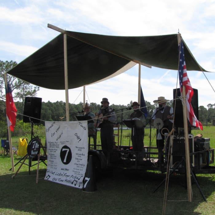 The band that played was called 7 Lbs of Bacon Mess Band. Their specialty is Civil War tunes so they played quite a few Stephen Foster songs and well-known songs of the 1860s. They played for a dance in the evening too.