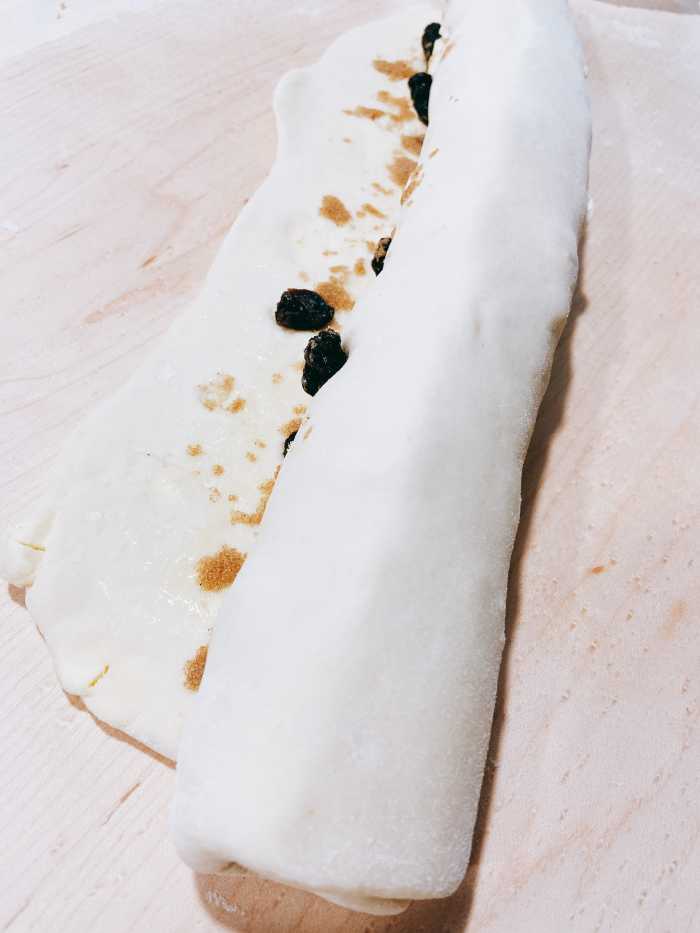 Roll the dough up tightly. 