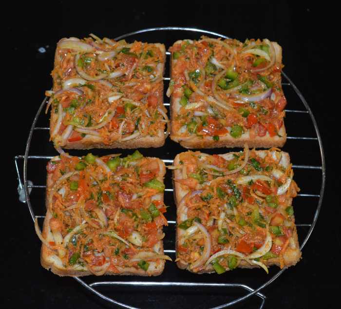 Place the stuffed bread slices on a grill stand. Place the stand in the oven and grill for 9 or 10 minutes.