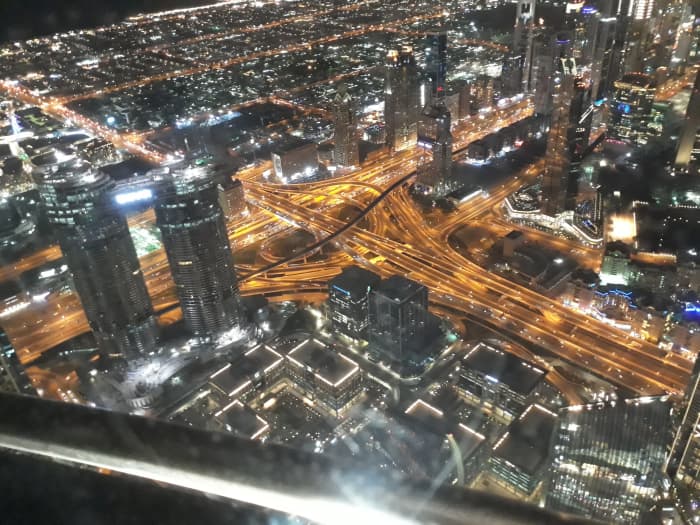 Dubai city lights viewed from Burj Khalifa Observation Deck on the 124th Floor