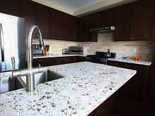 Natural quartz have been mined. The dust aggregate is fused with pressure heat resin binders for the solid slab.