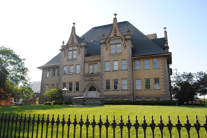 Former School for the Deaf is now an office building with a topiary park that draws many visitors each year.