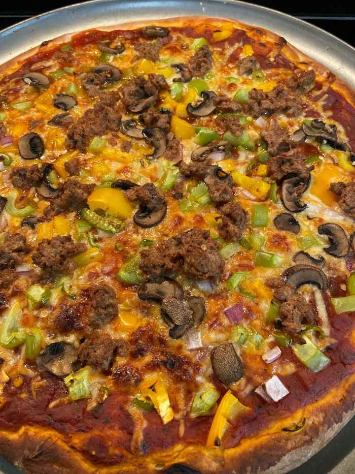 Voila! The pizza is done. We love crispy crust, so I let it bake until the crust turned brown. 