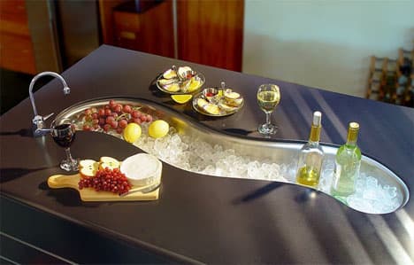 Beautiful food preparation sink and faucet with filtered water mounted under the kitchen counter top