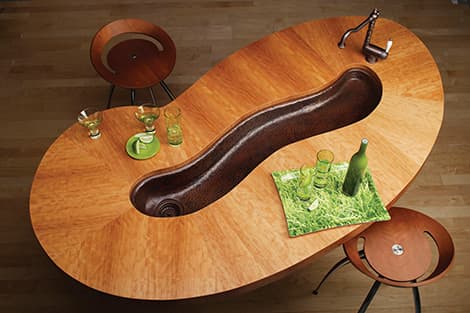 Beautiful food preparation sink and faucet with filtered water mounted under the kitchen counter top