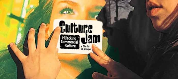 Cultural Jammers Hijacking Commercial Culture, logos and armed with DIy anti-ad stickers, custom neon, aiming to subvert and reclaim corporate media space