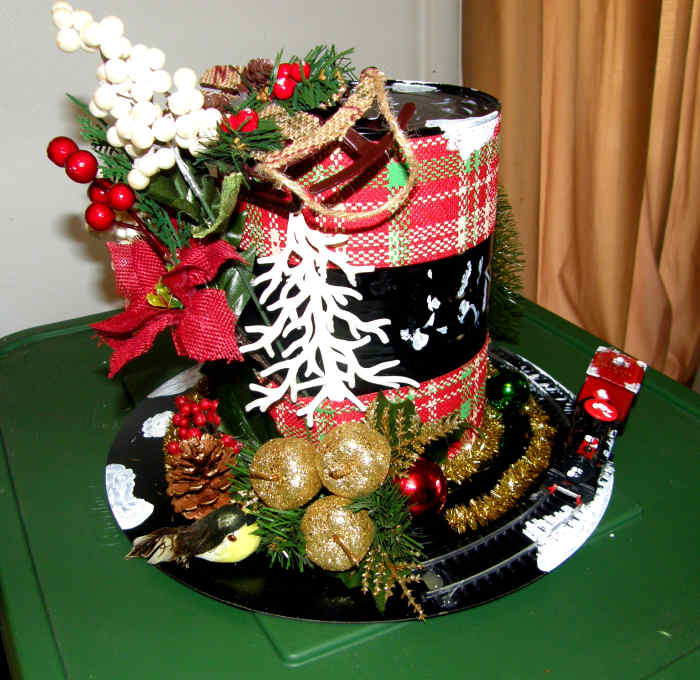 Snowman's Hat using recycled materials and my choice of decorations from the Dollar Tree. It cost me less than $8 to make.