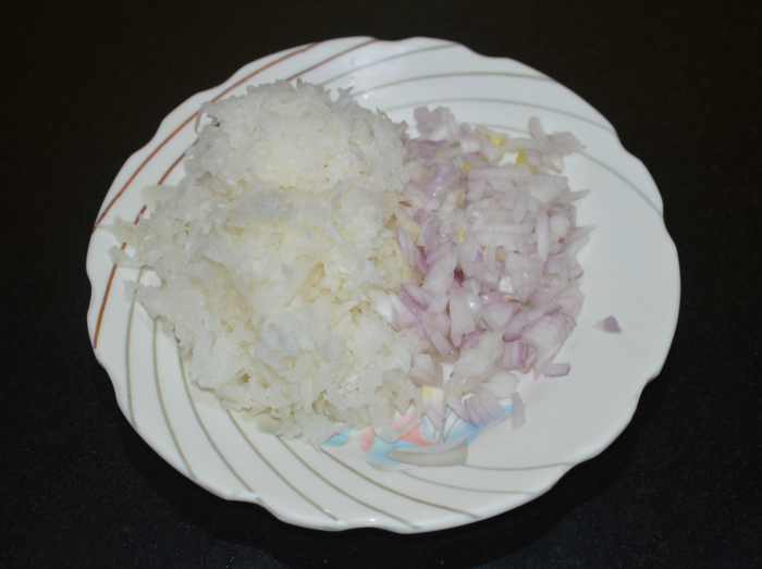 Step one: Wash, peel, and grate the radish and chop the onions as per instructions.