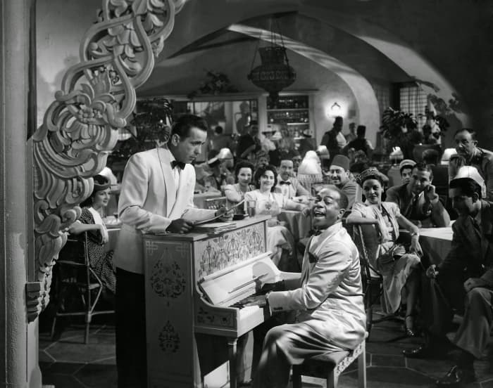 It's rare to find a film that not only becomes iconic visually but also provides an iconic song with the classic 'As Time Goes By'