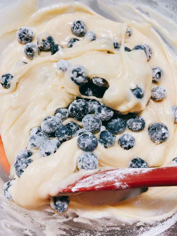 Add the blueberries into the mixture and stir to combine. 