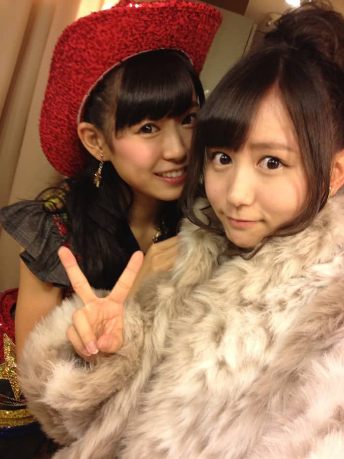 With Miyuki Watanabe (left). Mina Oba is all bundled up because she feels like she is cold but Miyuki is smiling and looks as happy as ever.