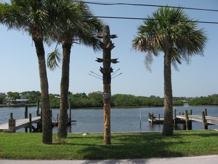 A totem to the saltwater fishing gods near our dock. Notice the huge heads from fish caught from the Cotee River.