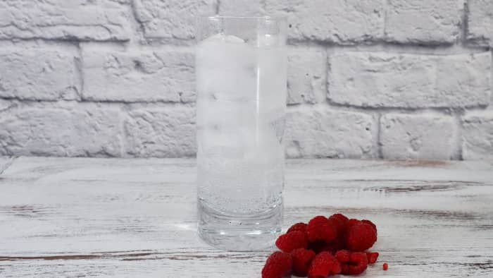 After carbonating your water, you can easily add some fruit for flavoring. Raspberries work particularly well.