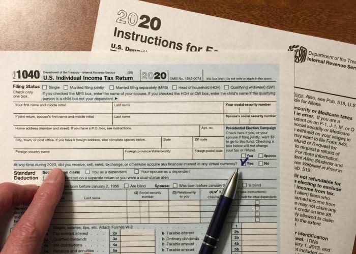 Checkbox on 1040 form indicating you received, sold, or exchanged cryptocurrency.