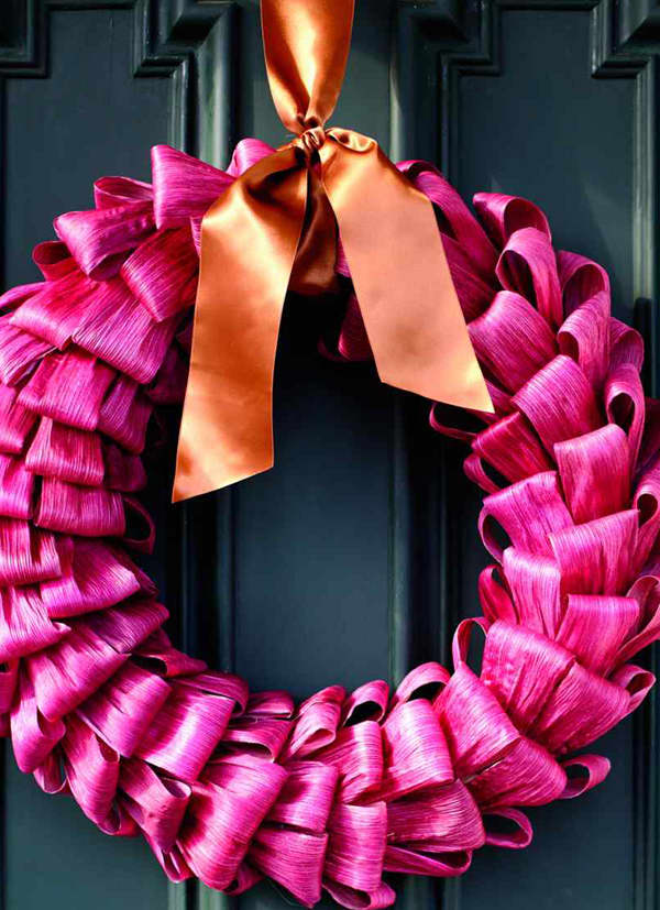 Richly dyed corn husks give a bold welcome to the season—perfect for color pink on the door. And for a party!