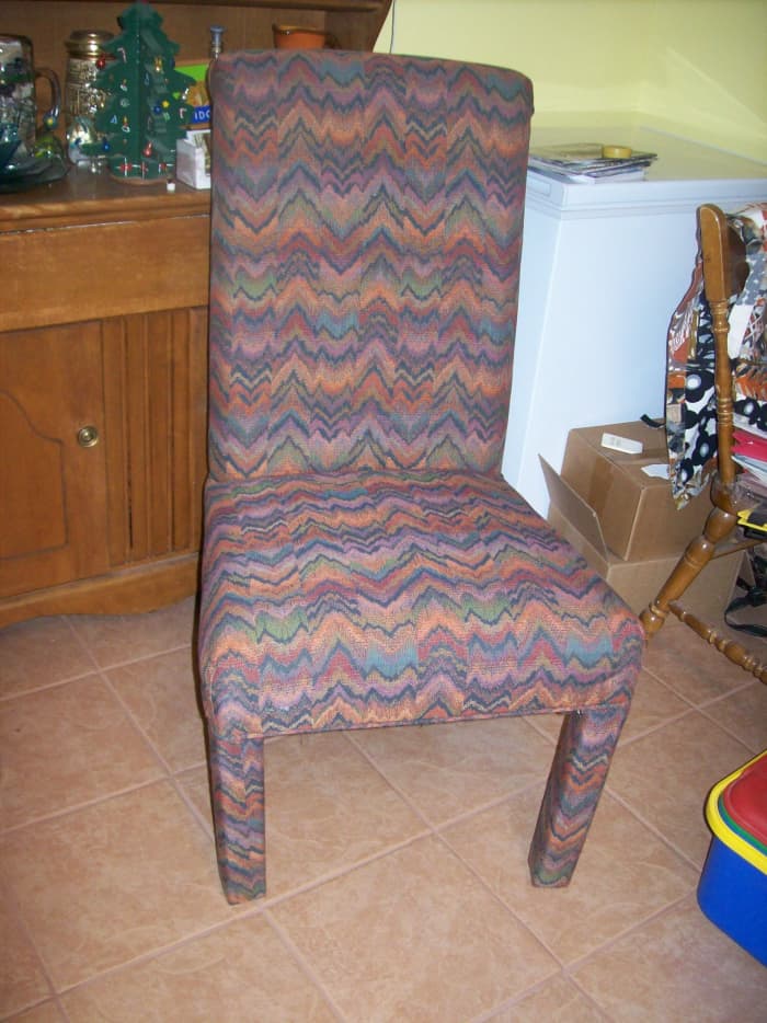 An upholstered chair, abandoned outside a restaurant with one broken leg. Cost: $1.95 small box sheetrock screws and 10 cents worth of glue. Oh, and elbow grease.