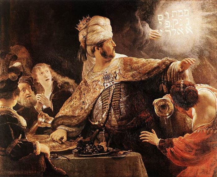 King Belshazzar is alarmed by the mysterious handwriting on the wall (Daniel 5:5-9)