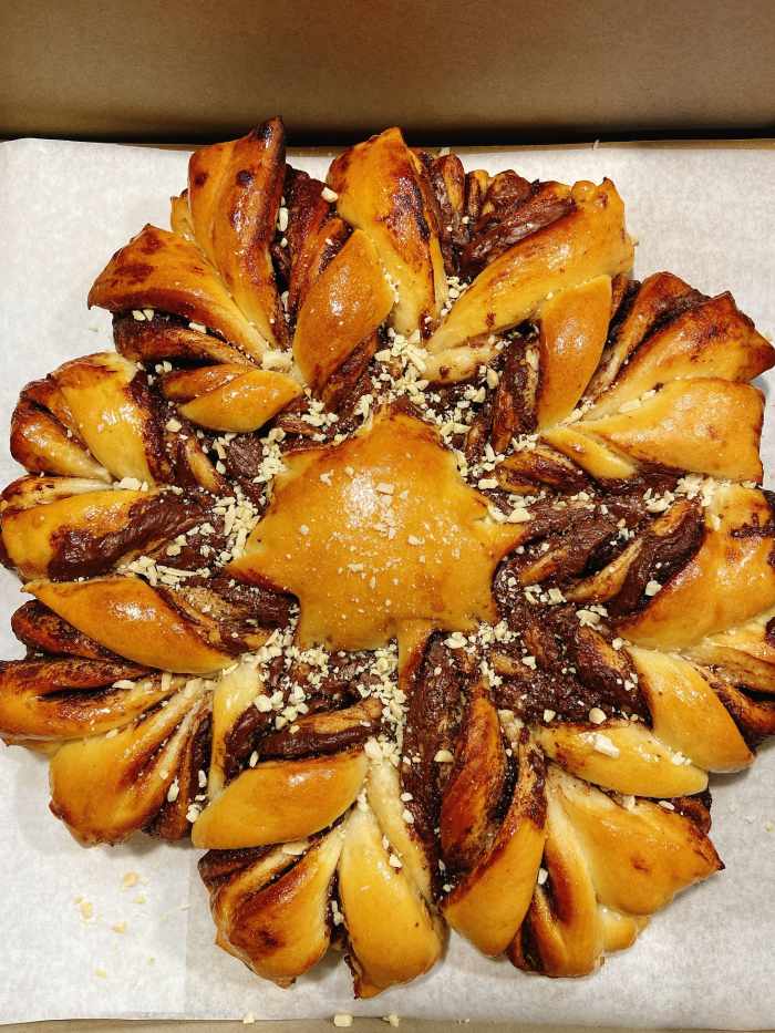 Beautiful twisted star bread with Nutella filling.