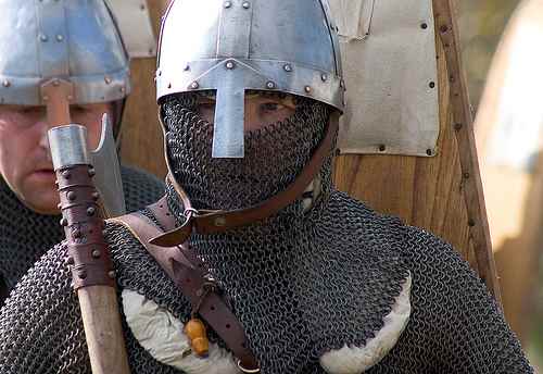 Only a knight with land and tenants could afford armour of this quality - Norman chain mail, helmet and weaponry on show