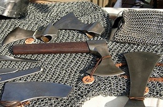 Close-order fighting demanded axes with shorter shafts. Long-handled Dane axes were only used in open battle, as when huscarls came out through the shieldwall to tackle William's mounted knights (with a shield-bearer who carried a thrusting spear)