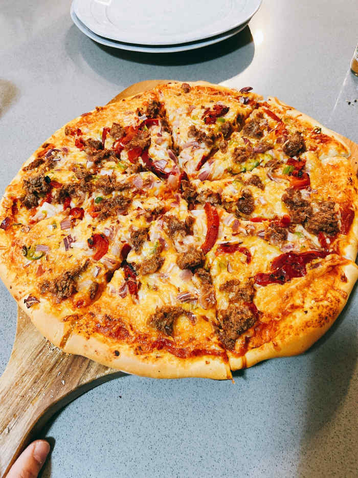 Homemade pizza with veggies and beyond beef. A delicious family favorite!