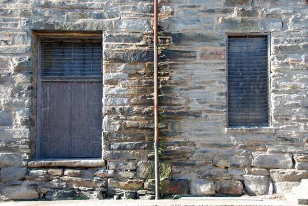 Windows, and Drains - Nature and Time has a way of coloring old stone that makes every wall a piece of art.