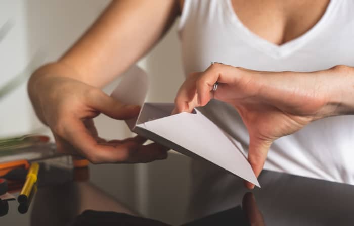 Carefully put the note in an envelope, use a pen with sufficient ink that writes fluidly, and position your stamp properly.