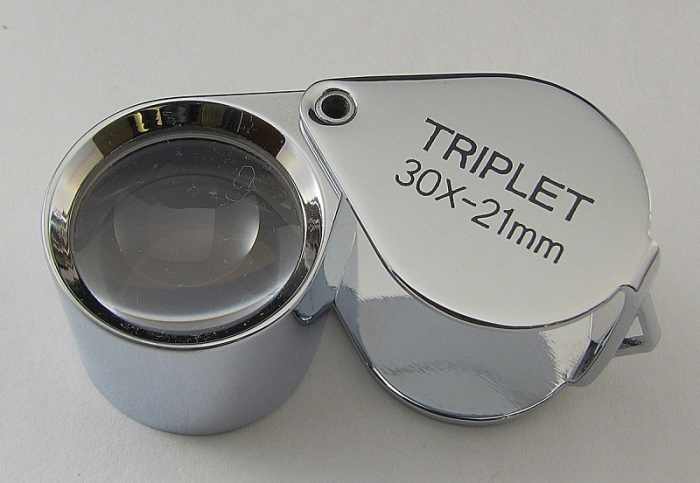 Jewelers use a magnifying glass known as an eye loupe to examine the hallmark.